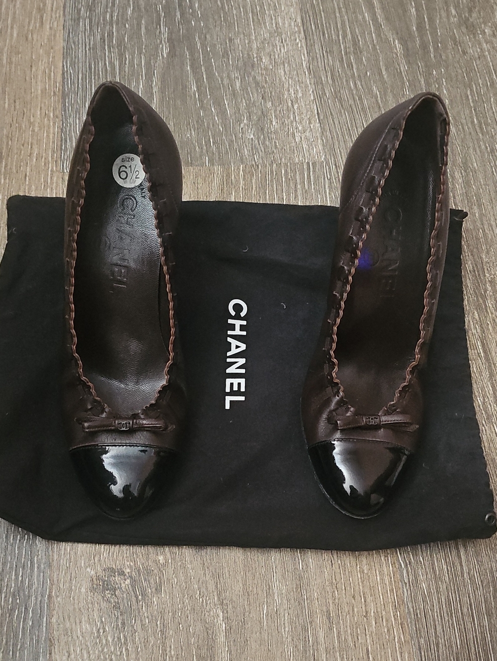 CHANEL Brown Leather Ballet Flats with Black Patent Cap Toe